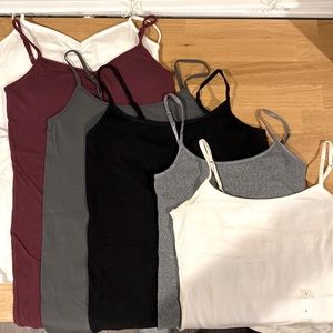 NWOT. Set of 6 Camis. Long lean style. From Kohls. New without tags.